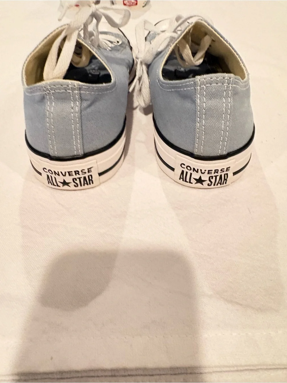 Converse Low-Top Sneakers in Light Blue and White